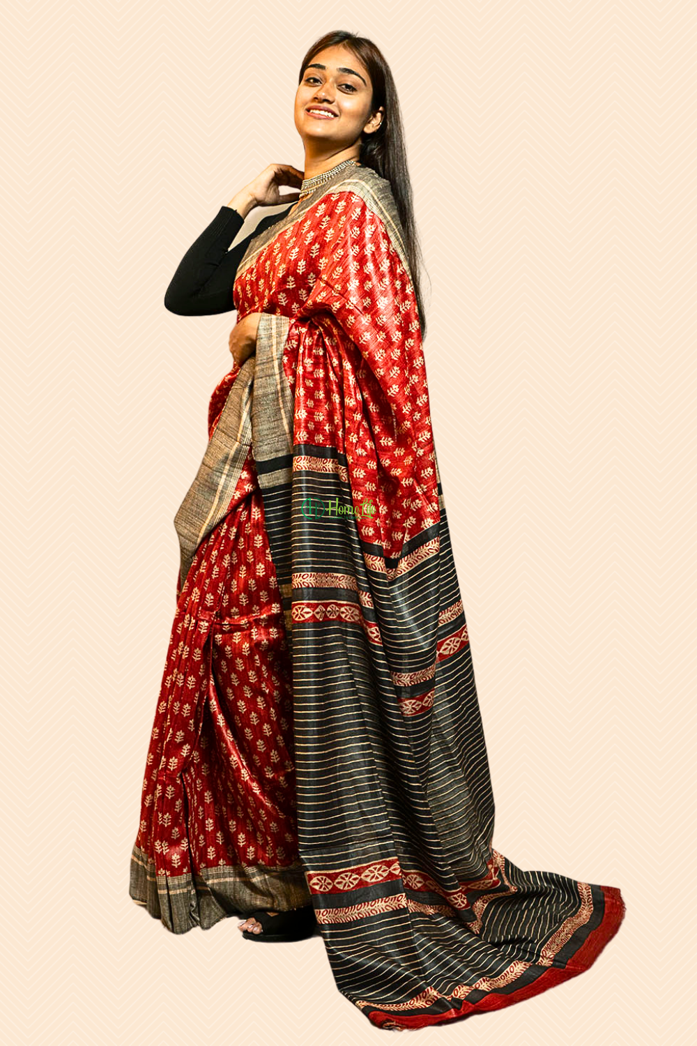 Orange printed ghicha saree with black contrust