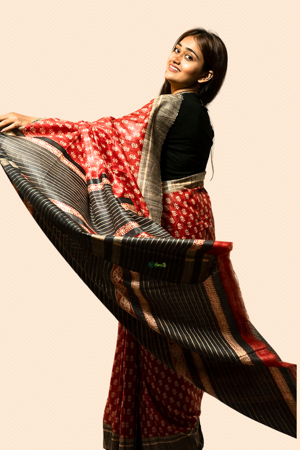 Orange printed ghicha saree with black contrust