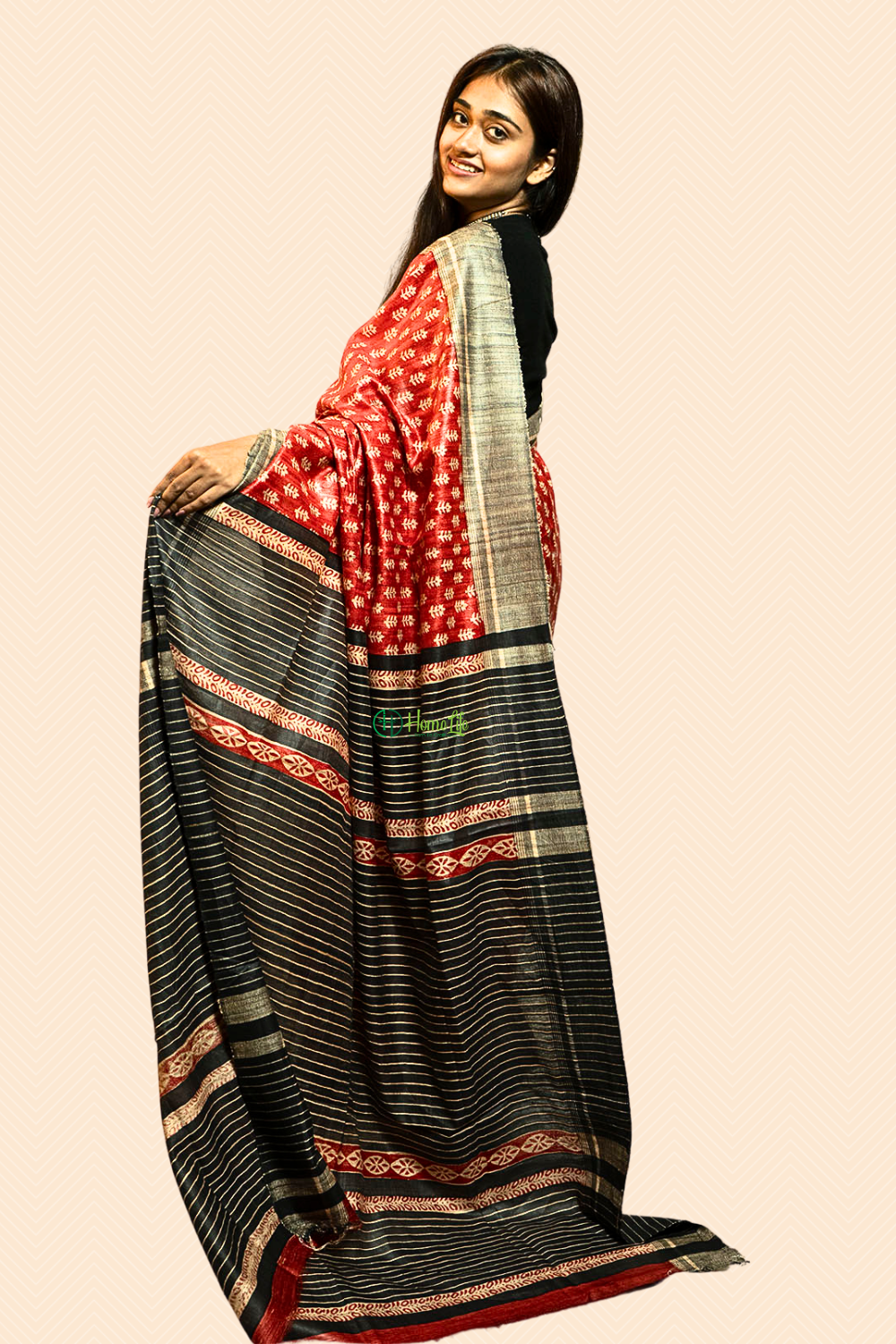 Orange printed ghicha saree with black contrust