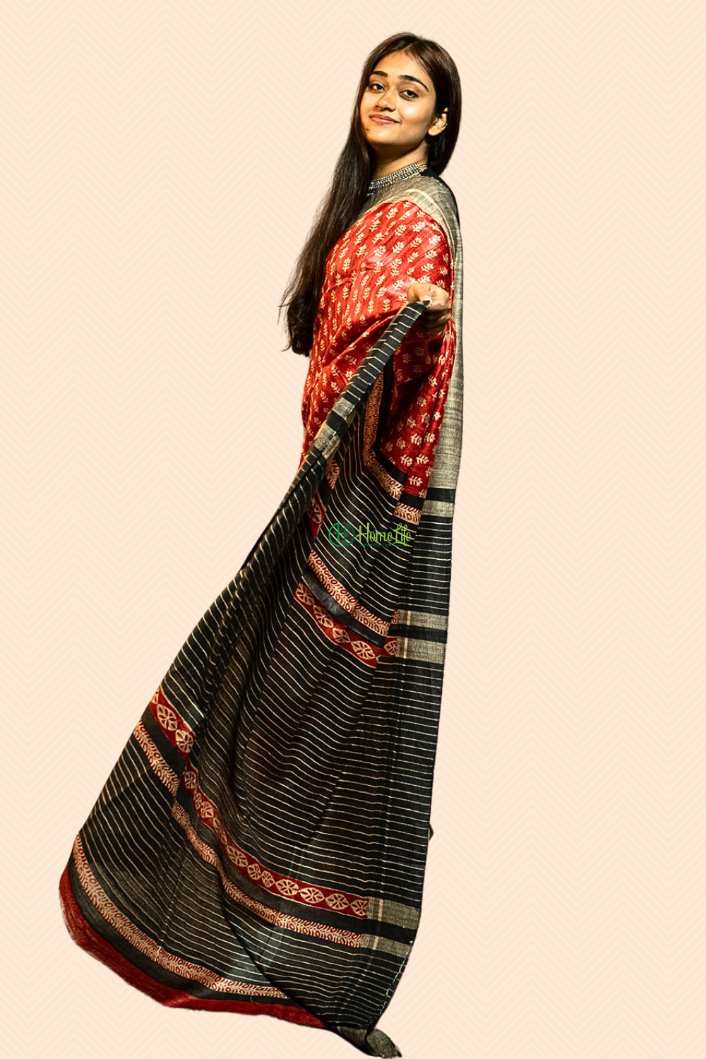 Orange printed ghicha saree with black contrust