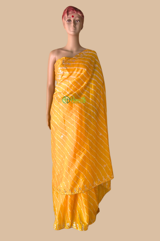 Aarna golden yellow leheriya with pitta work saree